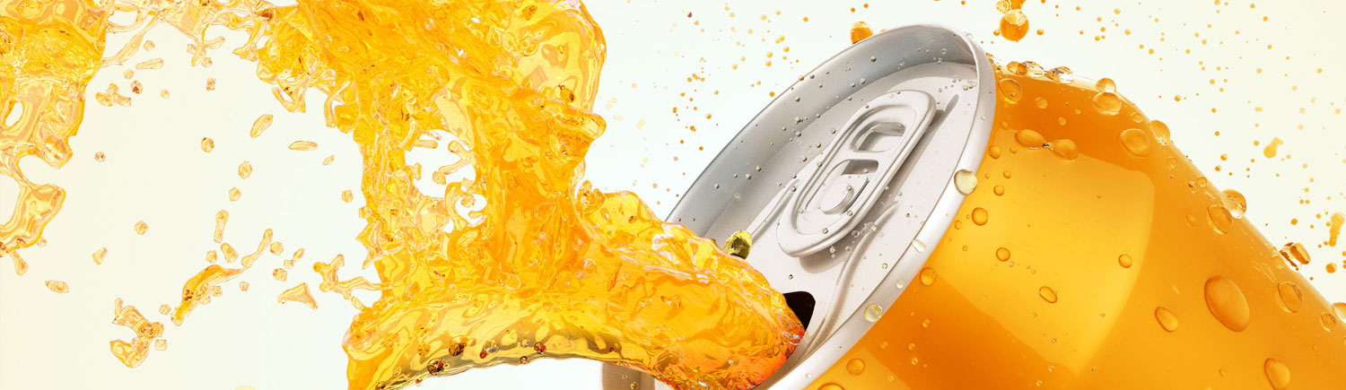 An image of an orange beverage can with liquid splashing out.