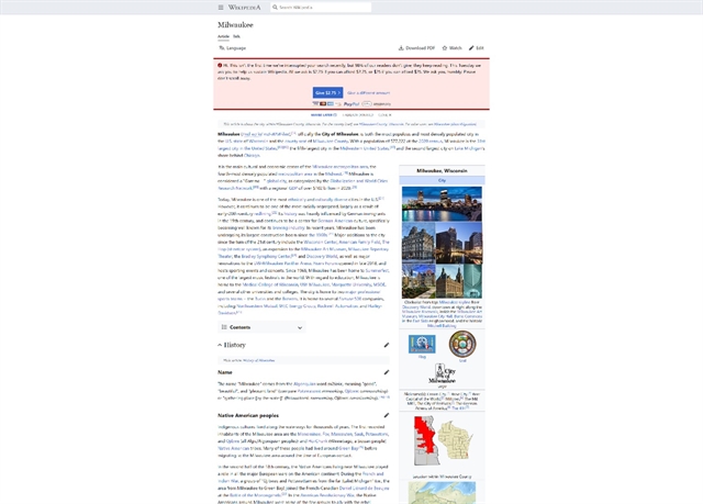 Image of a Wikipedia page that shows how content is constrained in the center with white space on either side when viewed on a large-scale display.