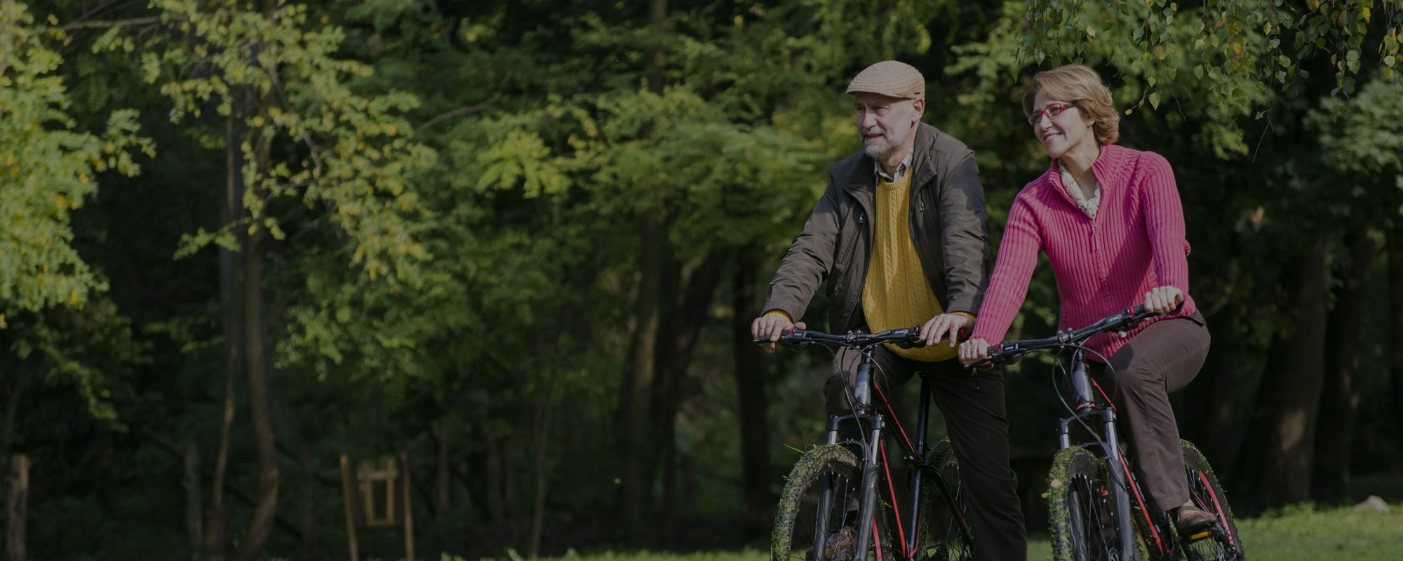 older couple riding bikes
