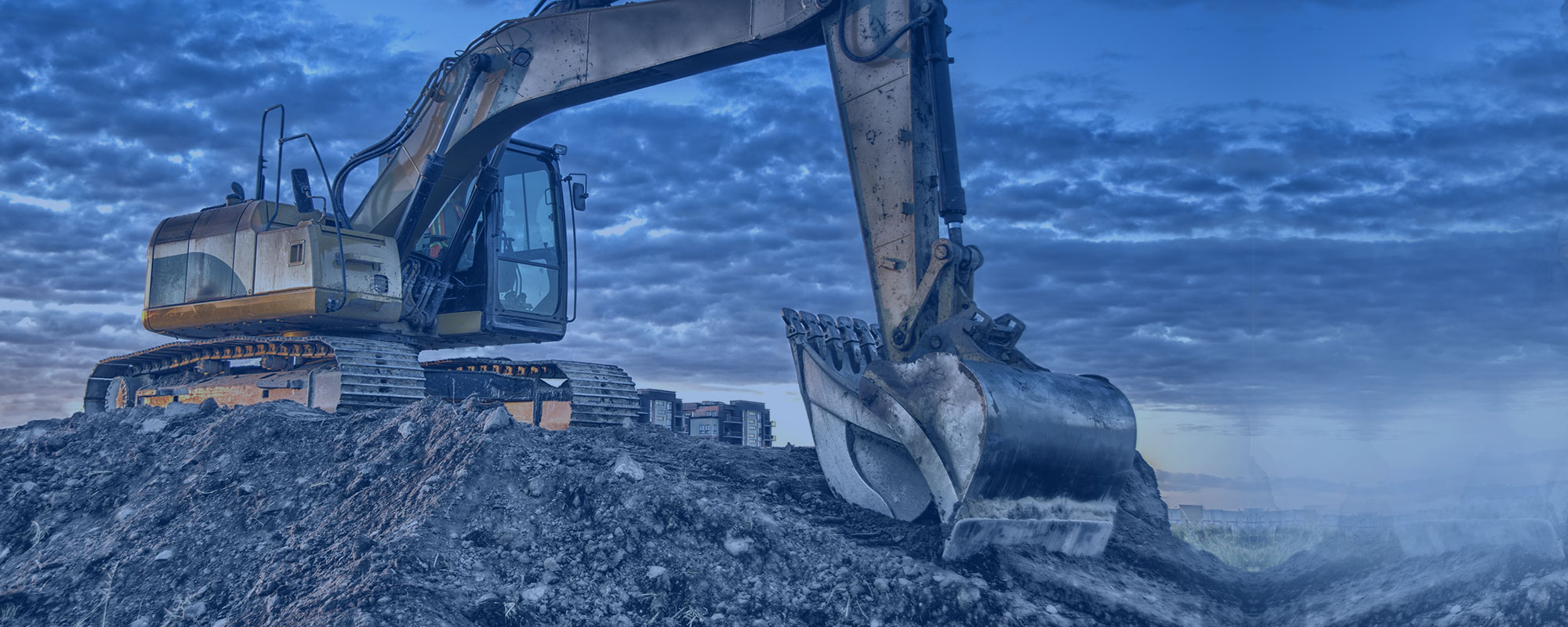 large digger picking up dirt