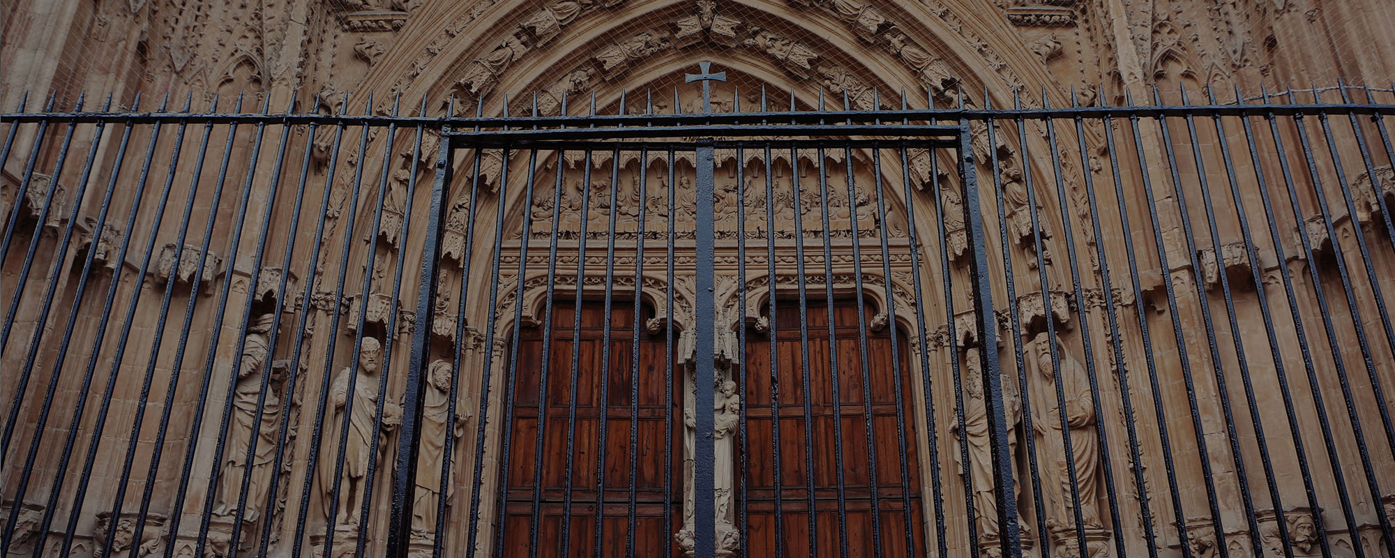 front of a church with closed gate