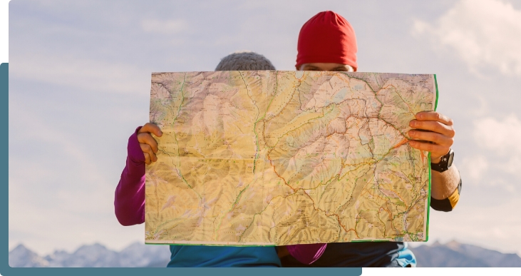 hikers looking at a map