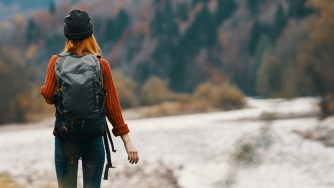 hiker near a river